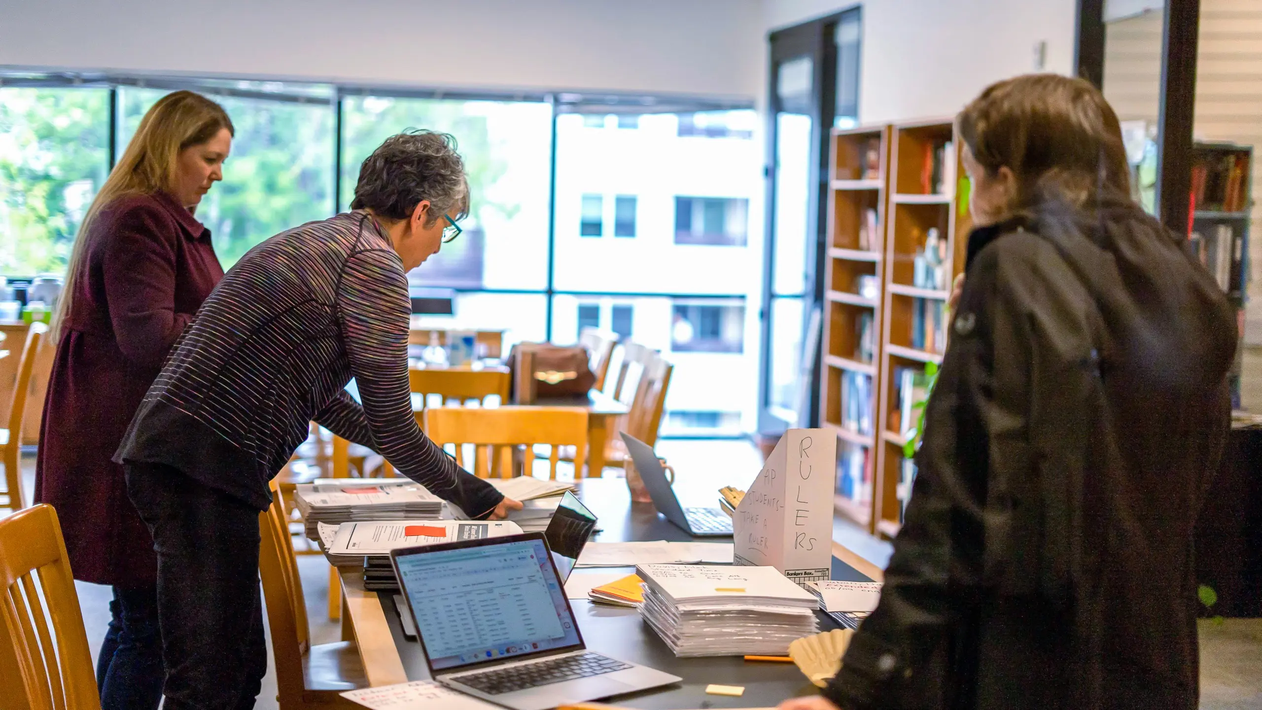 Audra Robinson doing Admin work with Other Teachers