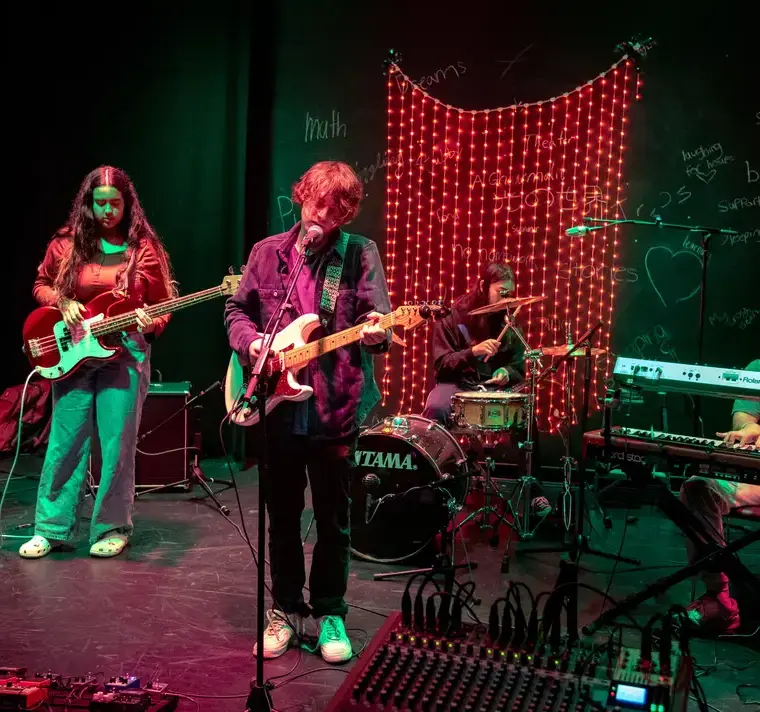 Students Playing in Band on Stage