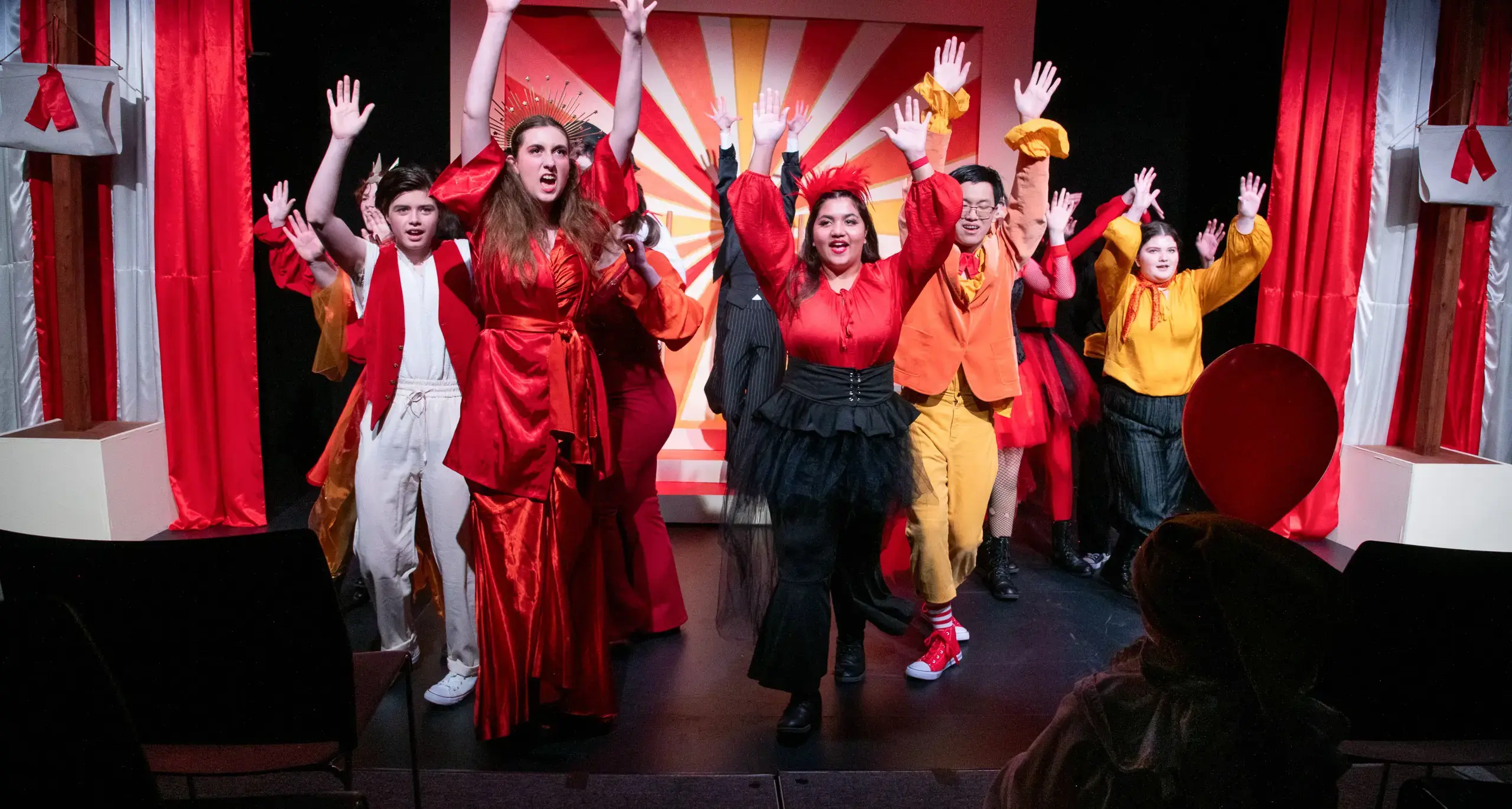 Students Performing Theatre Wearing Costumes